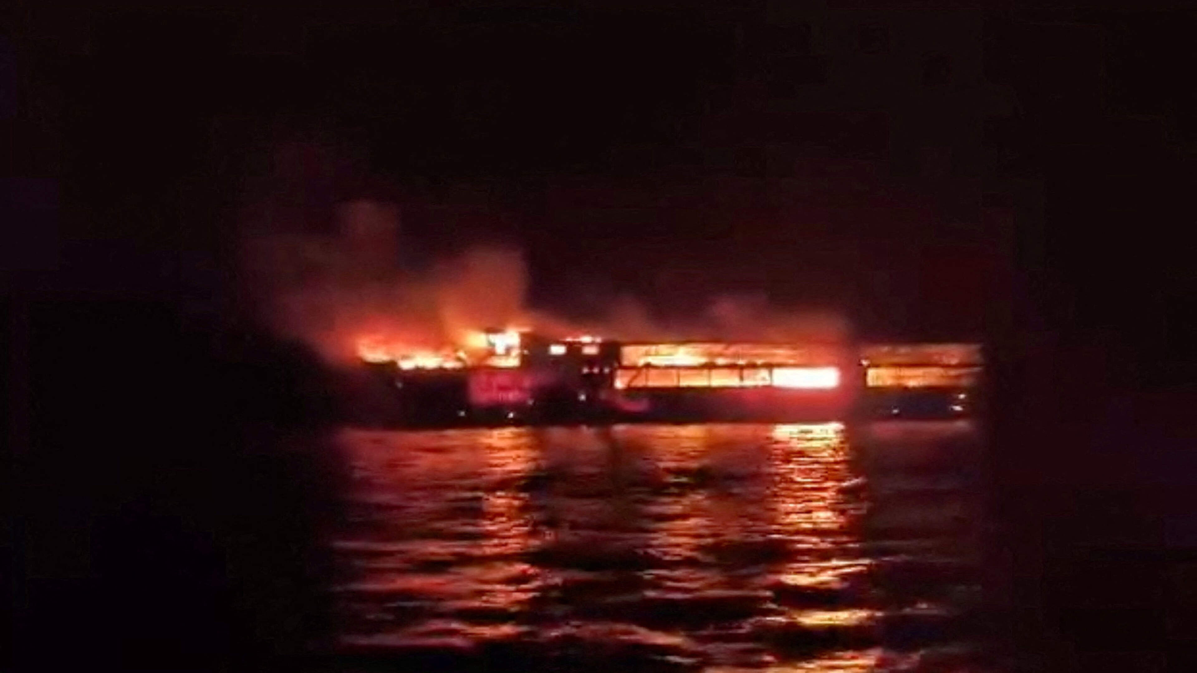 Philippine ferry fire kills five and leaves dozens of passengers missing